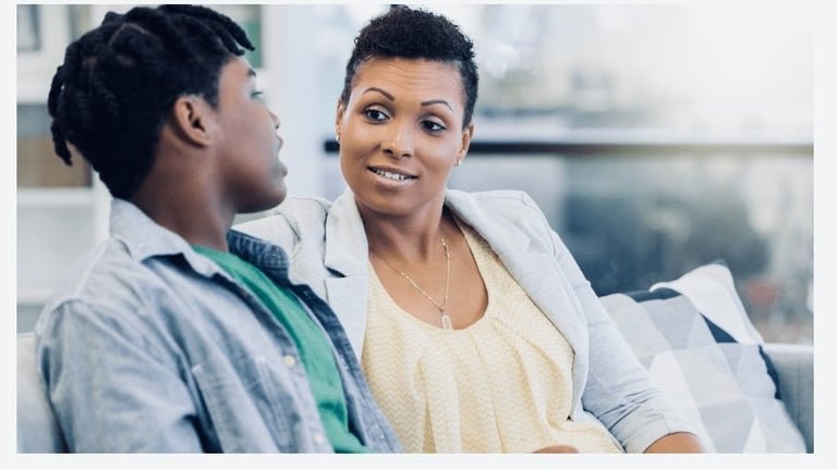 Couple sitting together during a couples therapy session