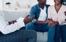 Couple in a therapy session with a counselor
